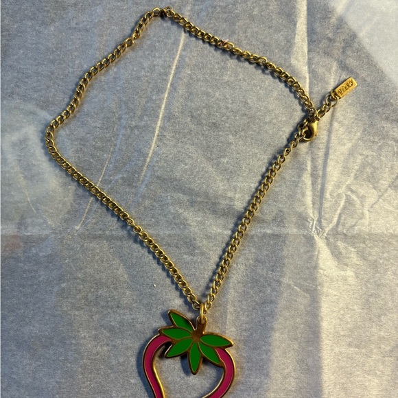 Gold tone and Pink Foxy brand Strawberry Necklace with Green Leaf Accent - Picture 2 of 4